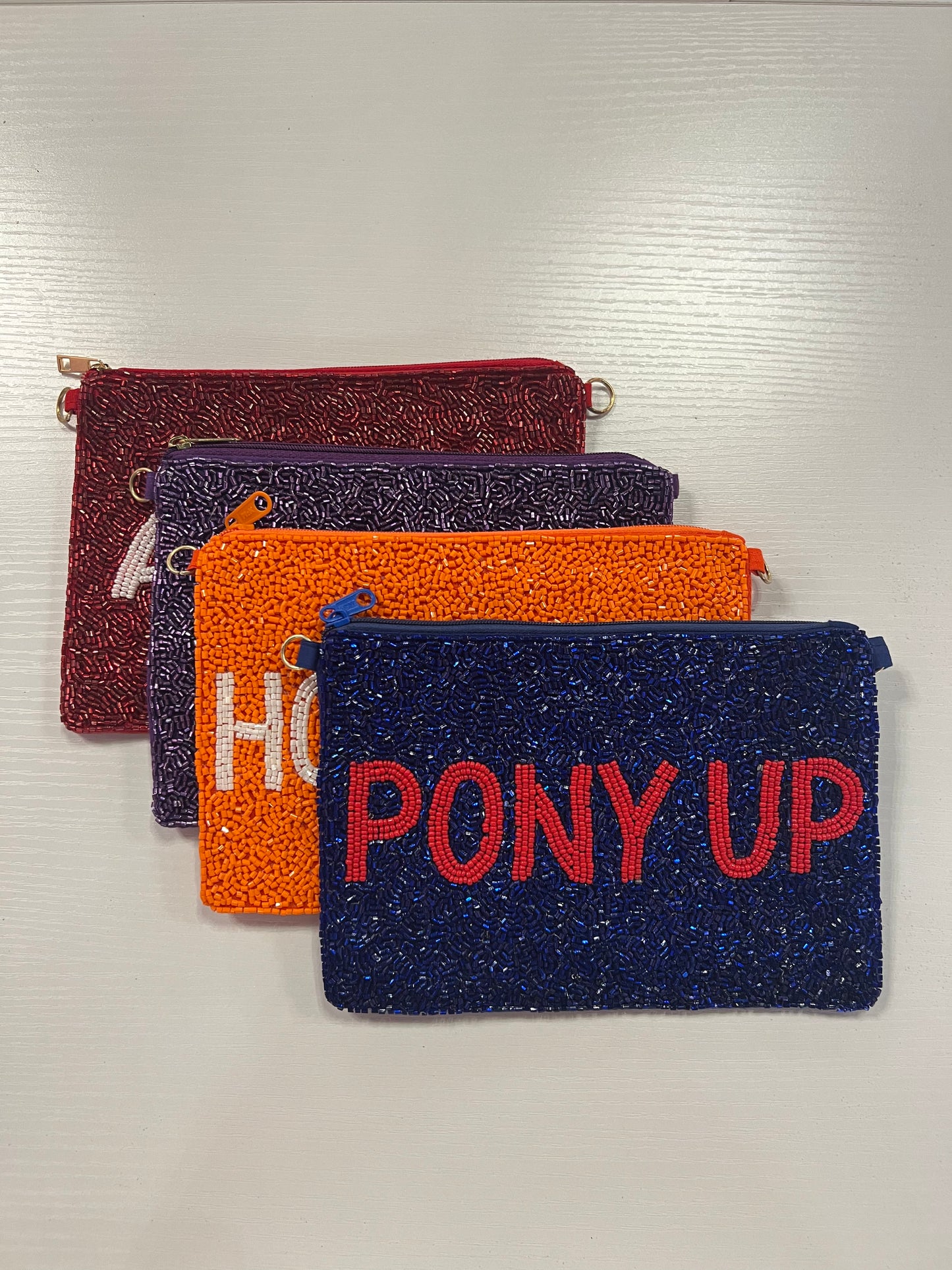 Beaded pouch pony up