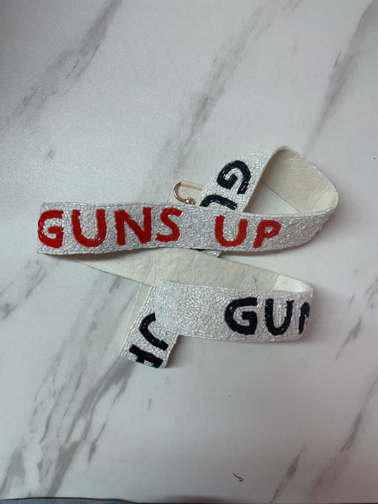 Guns up red/black Strap