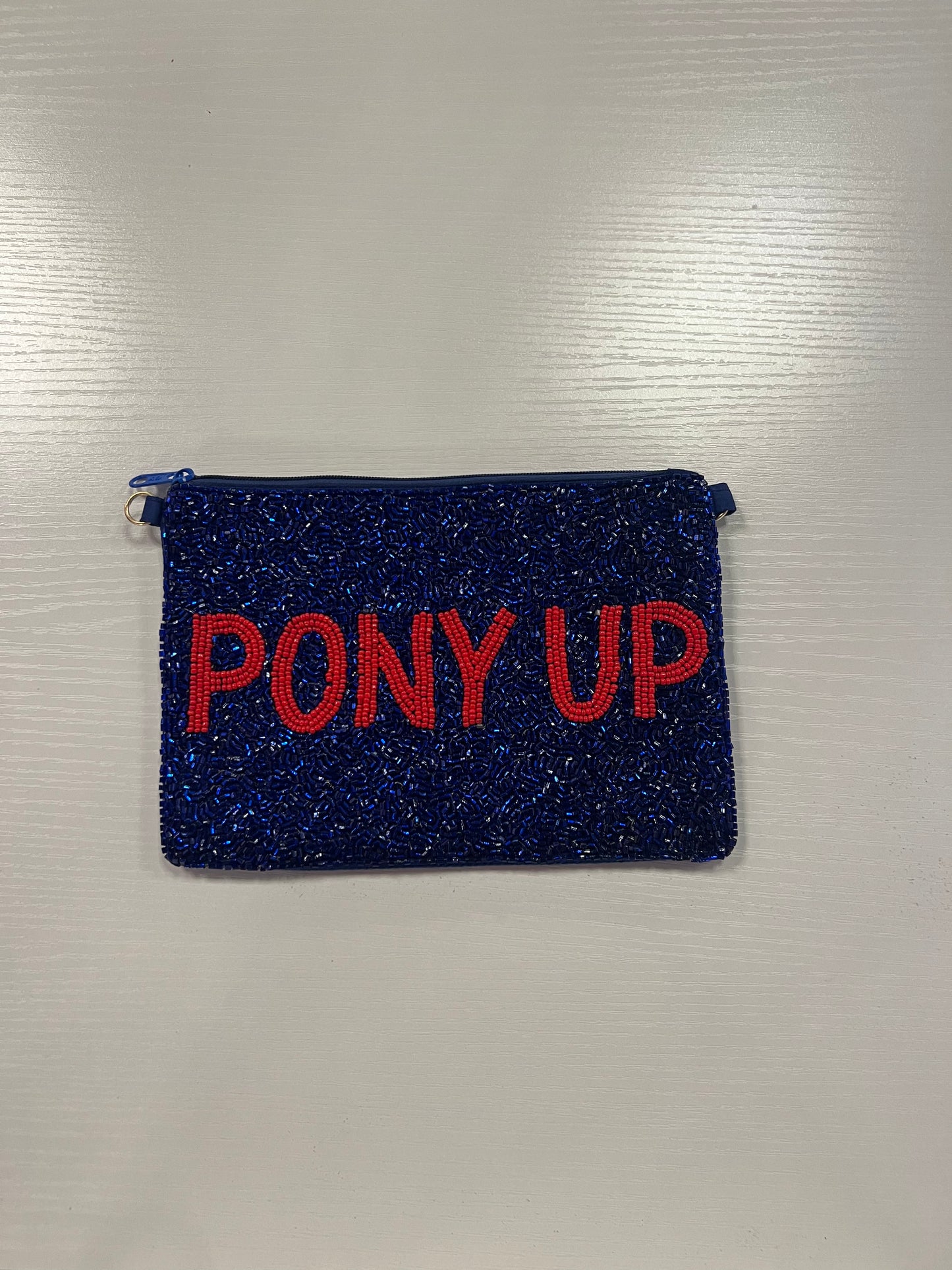 Beaded pouch pony up